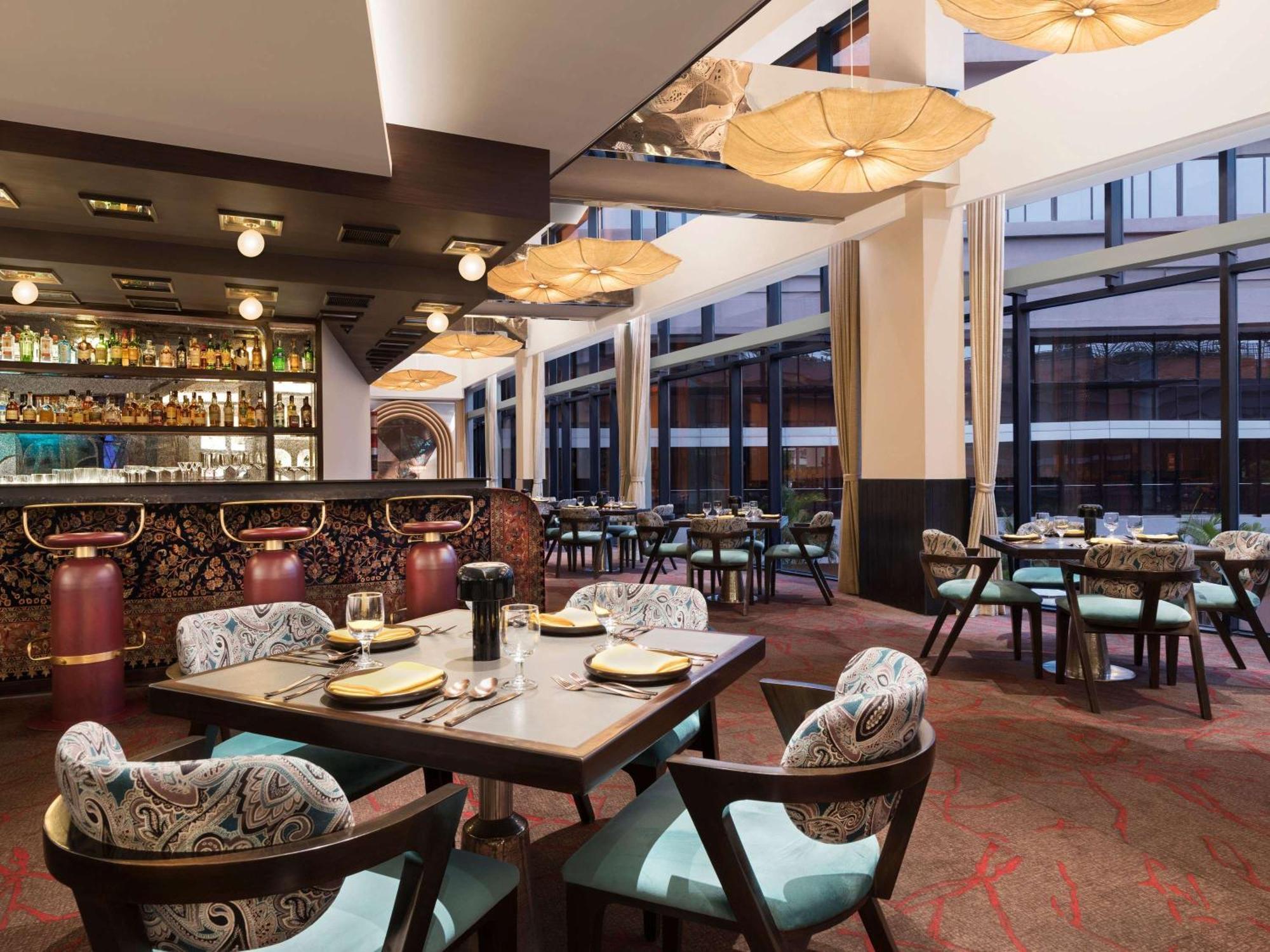 Novotel Kolkata Hotel And Residences Экстерьер фото The restaurant