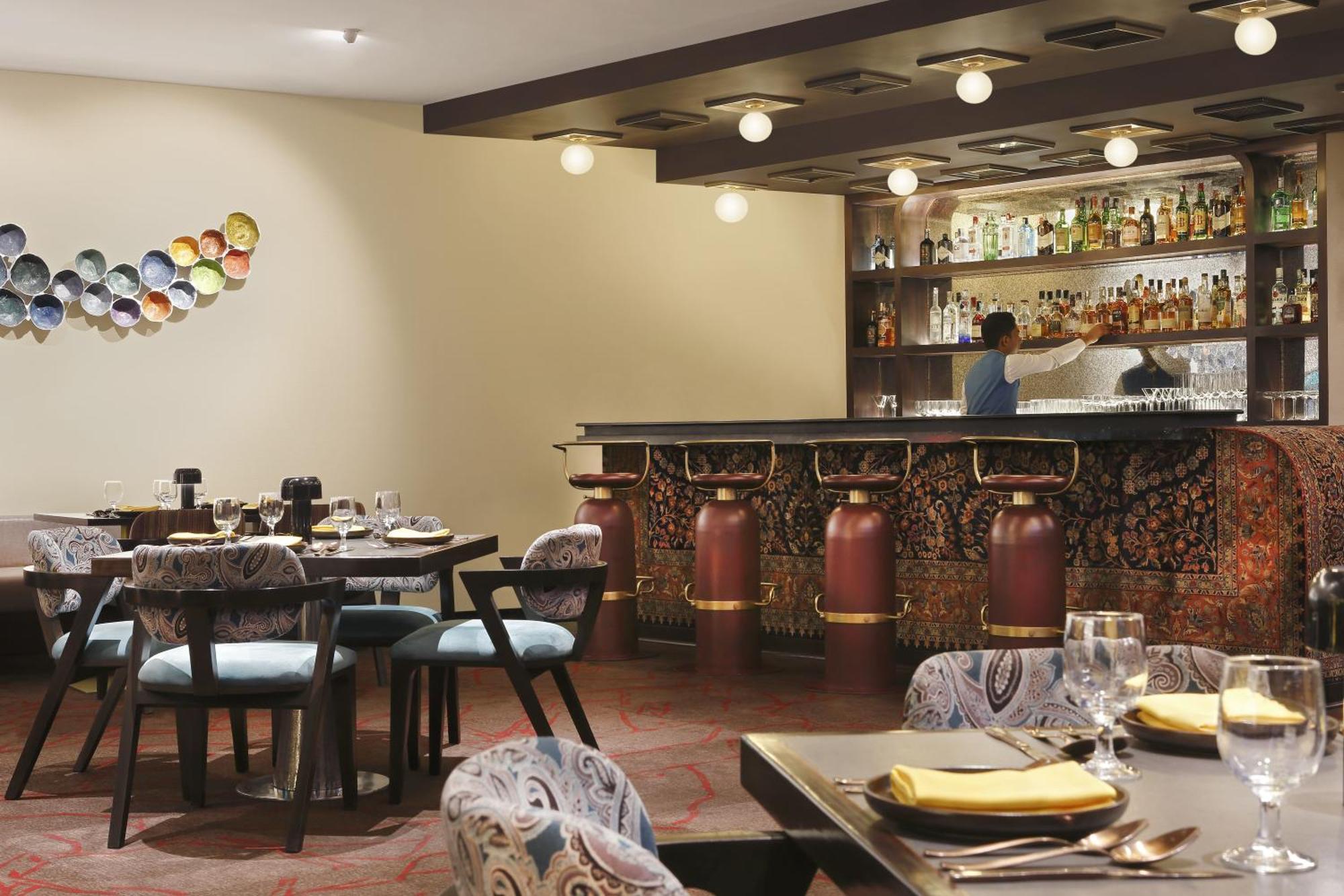 Novotel Kolkata Hotel And Residences Экстерьер фото The bar at the restaurant